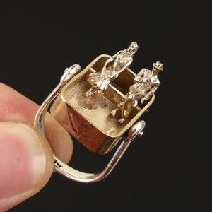 Tiny Lovers ring, sitting in the park. Sterling